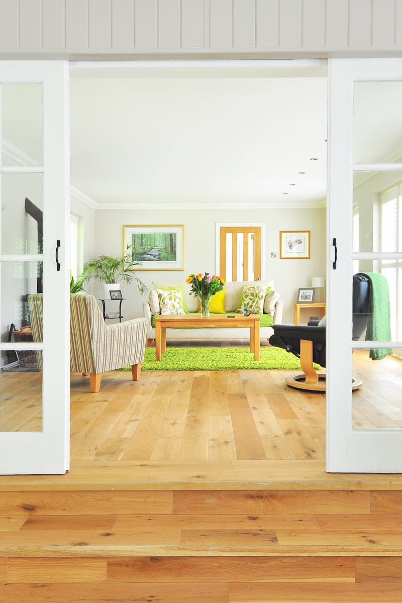 A bright and open living room showcasing contemporary interior design and luxury furnishings.